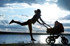 woman running with stroller