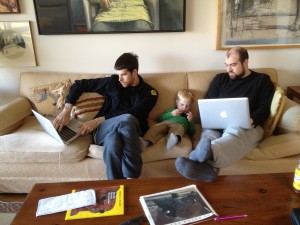 three men and their Apple products